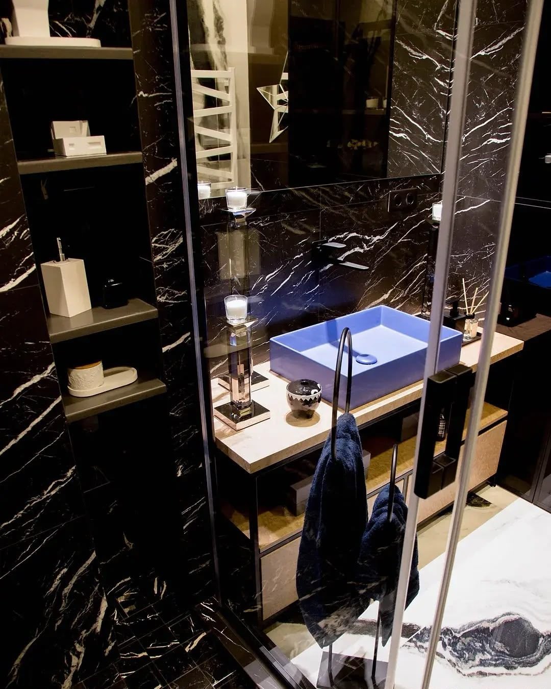 Bathroom vanity in timber with black marble surround, wide view, Dubai