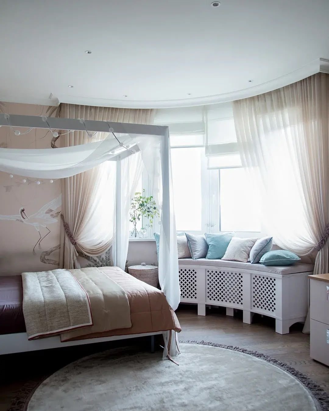 Girl's bedroom with canopy bed and fitted storage, wide view, Dubai