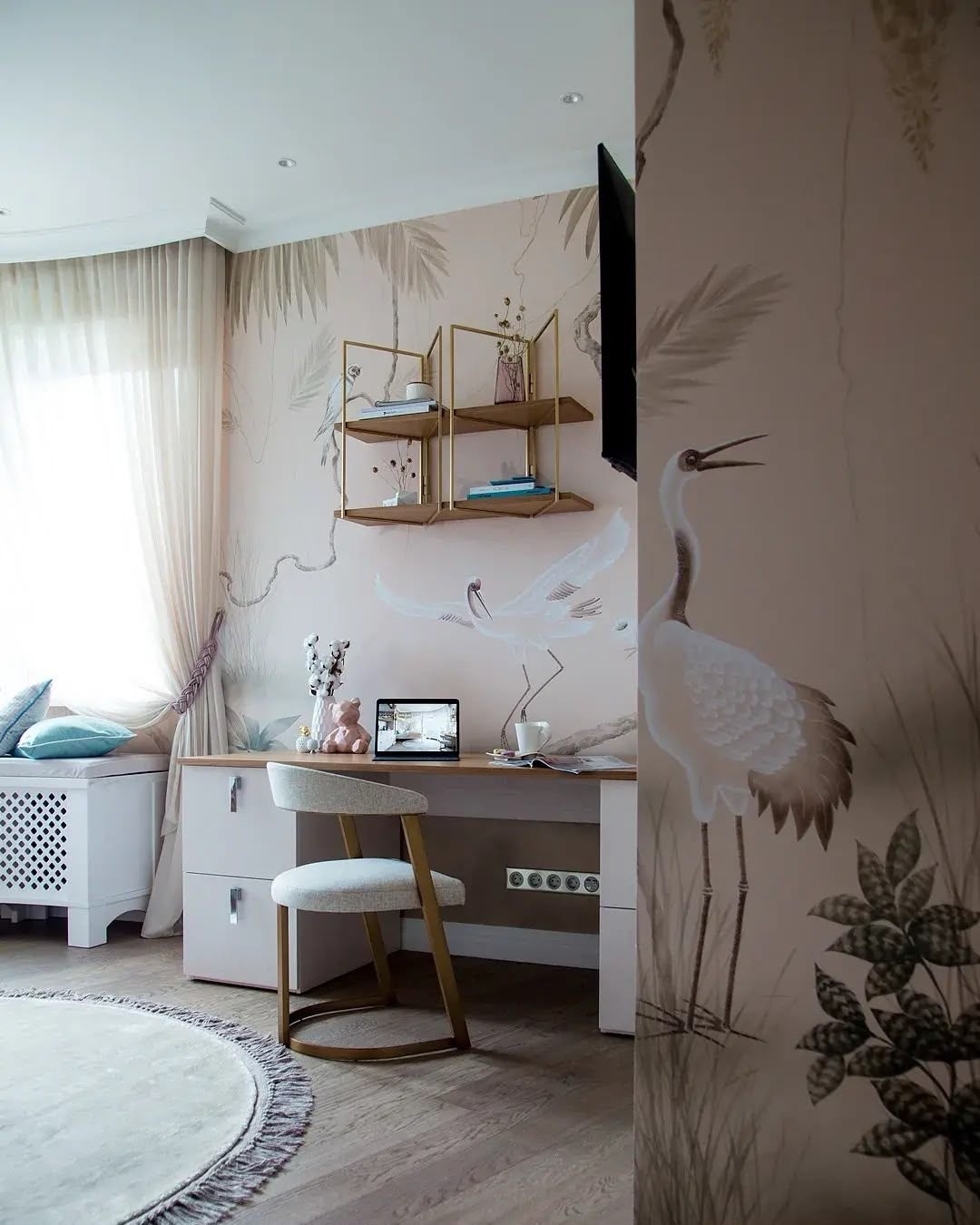 Girl's bedroom study with bird-print wallpaper, Dubai