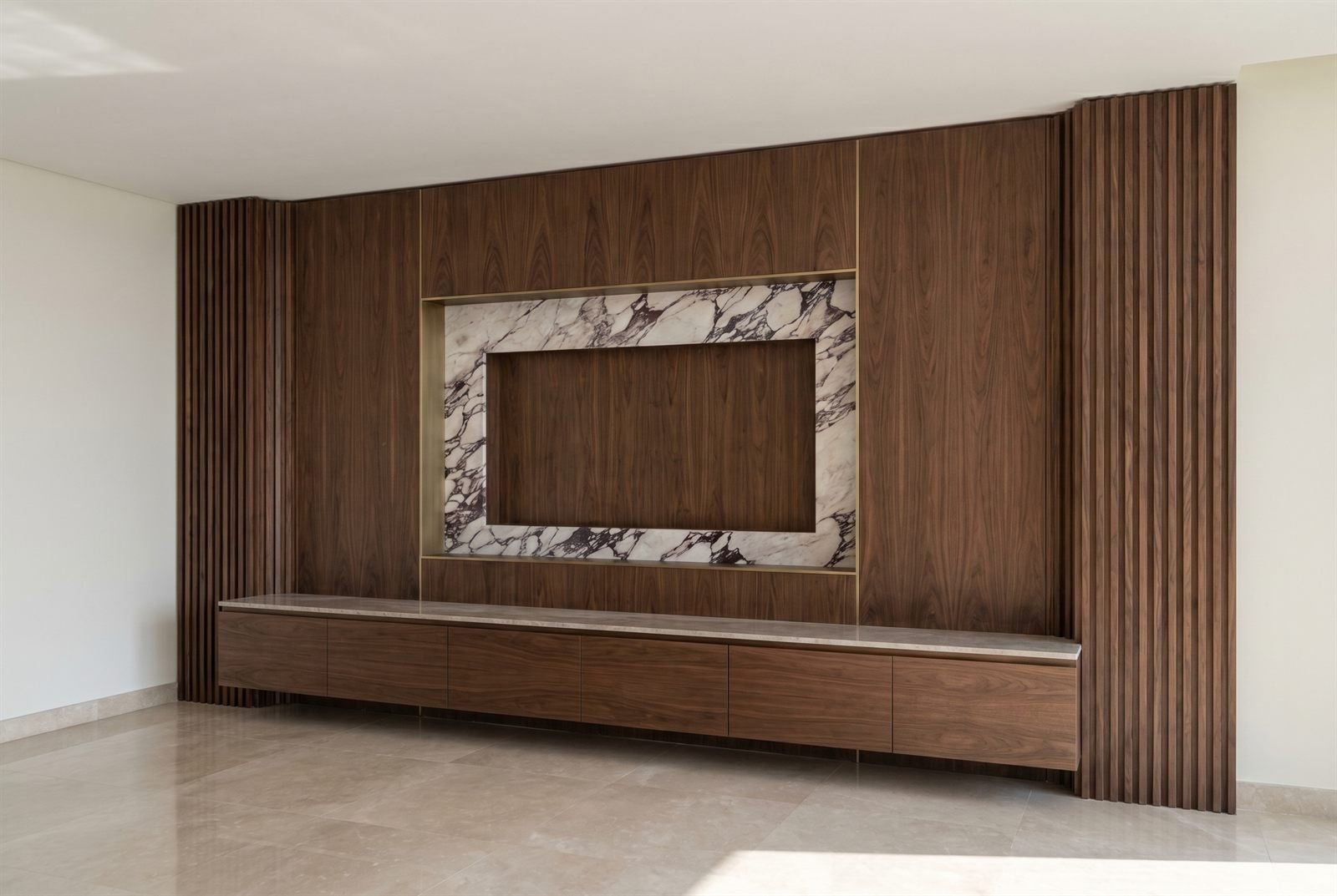 Living-room media feature wall in a Dubai apartment