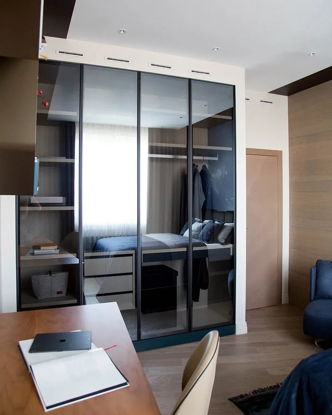 Bedroom with mirrored wardrobe and integrated study desk, Dubai
