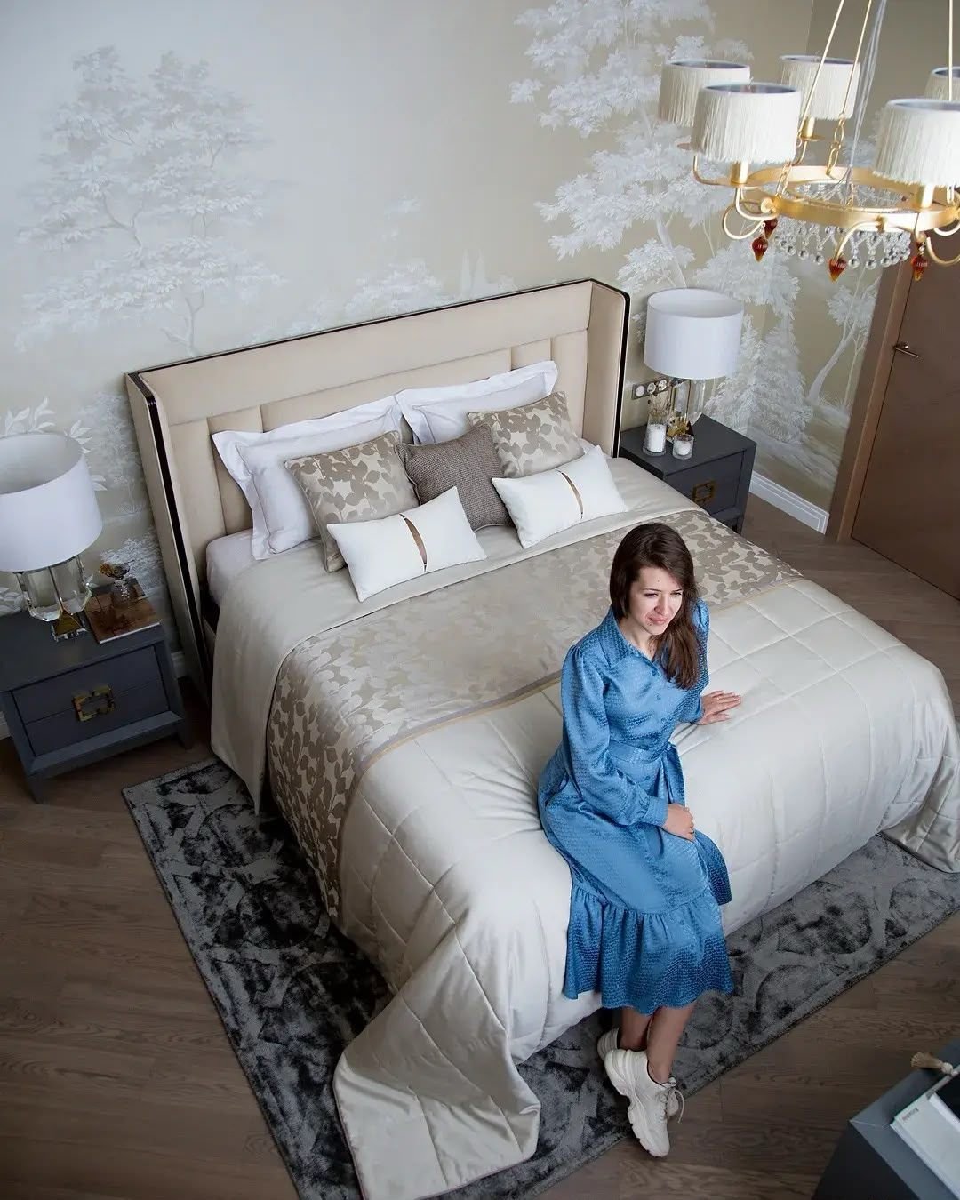 Neutral bedroom overhead view with fitted joinery, Dubai