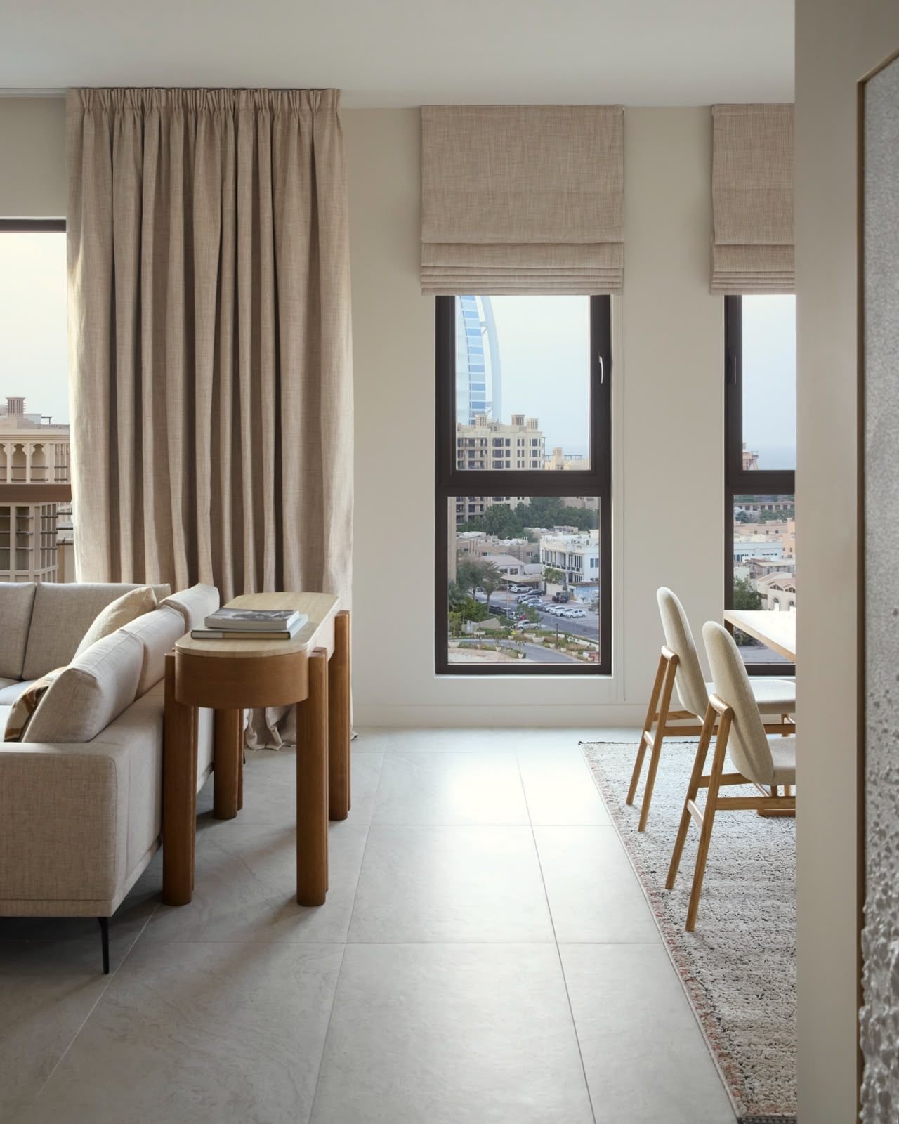 Open-plan living and dining room with fitted joinery, Dubai