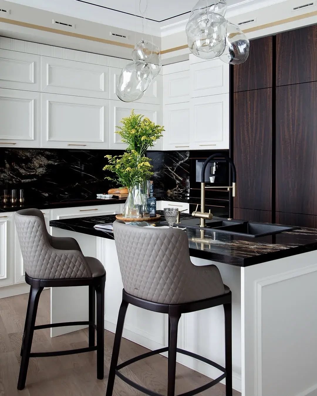 White kitchen island with bar stool seating, Dubai